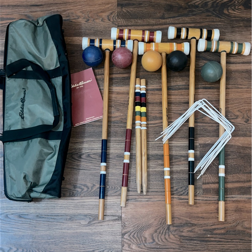 Vintage croquet game of 5 players with original manual.